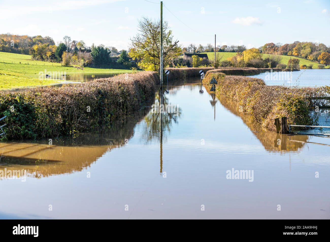 Floodwater from the River Severn filling the lane to Apperley in the Severn Vale village of Deerhurst, Gloucestershire UK on 18/11/2019 Stock Photo