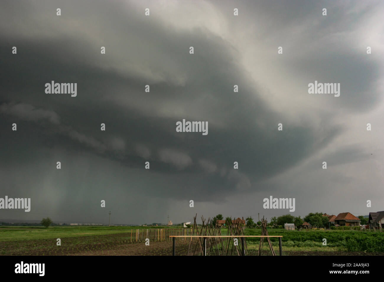 Dramatic sky as a severe thunderstorm with shelf cloud approaches in eastern Europe Stock Photo