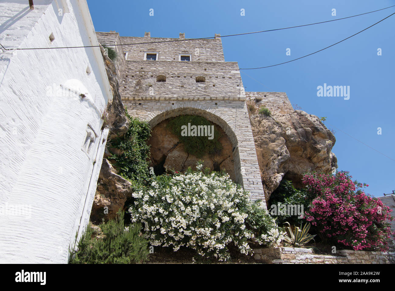 Wall on  a cliff in Apiranthos, the marble village in Naxos, Greece Stock Photo