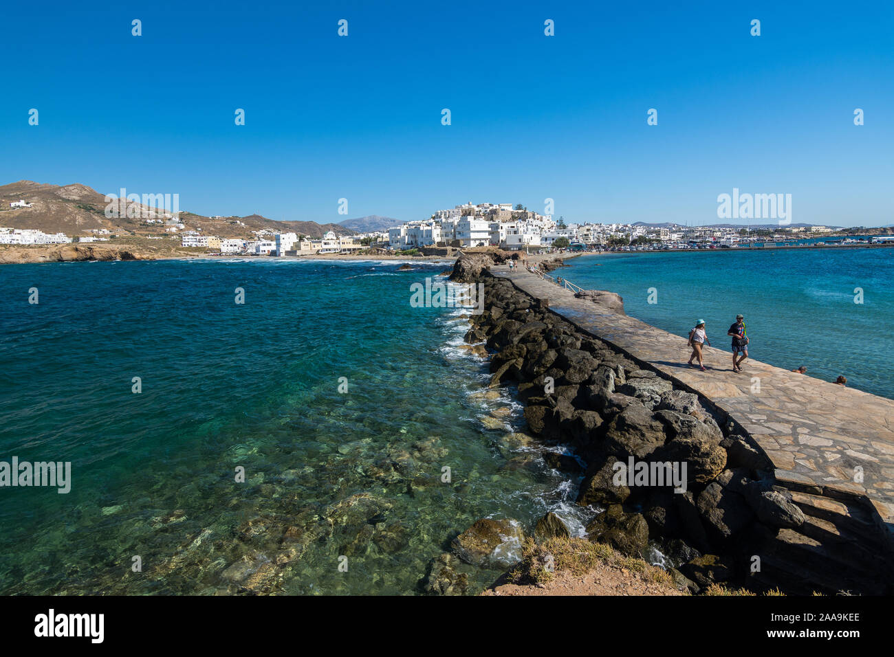 Naxos, Greece - July 12, 2019: View of Naxos capital Chora from the portara promenade area on a sunny afternoon Stock Photo