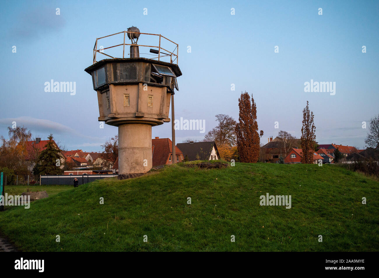 19 November 2019, Saxony-Anhalt, Hötensleben: An observation tower in the border museum Hötensleben. The preserved complex was once part of the inner-German border. In the background you can see buildings of the village. Photo: Klaus-Dietmar Gabbert/dpa-Zentralbild/ZB Stock Photo