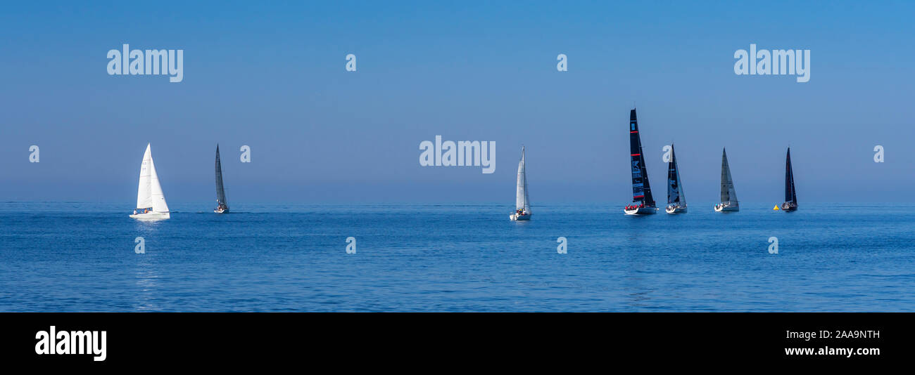 Recreational sailing with a variety of sailboats in the Adriatic Sea off the coast of Piran, Slovenia, Europe. Stock Photo