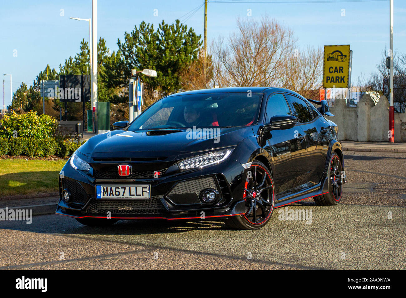 2017 black Honda Civic GT Type R Vtec; Car at Southport, Merseyside. North-West Supercar show event as of cars, sports, coupés, roadsters, supercars, hypercars, race cars, exotic car owners and super SUVs, arrive in the coastal resort on a warm spring day. Cars are bumper to bumper on the seafront esplanade as supercar owners enjoy a motoring meet. Stock Photo