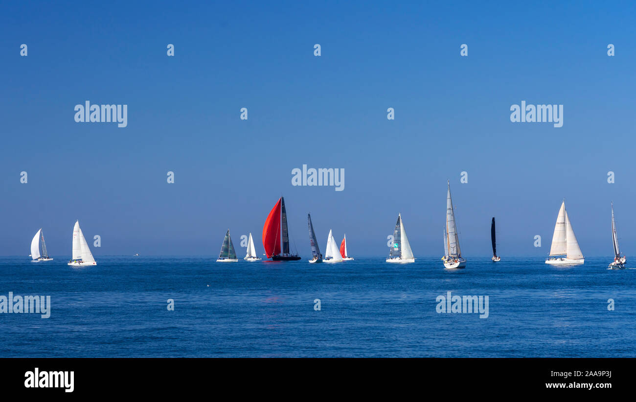 Recreational sailing with a variety of sailboats in the Adriatic Sea off the coast of Piran, Slovenia, Europe. Stock Photo