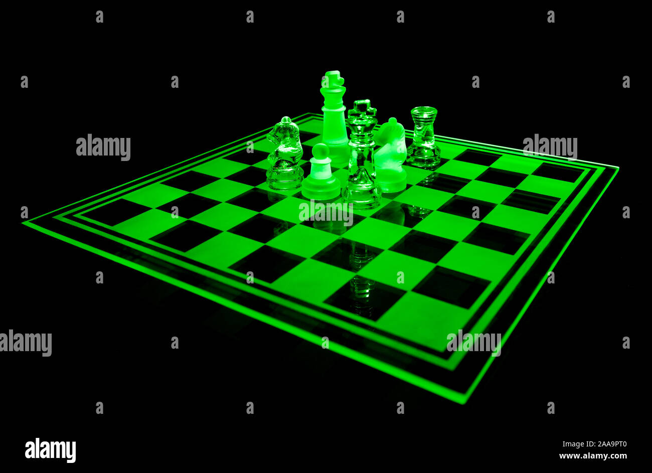 Glass Chess Board and Pieces in Green Stock Photo