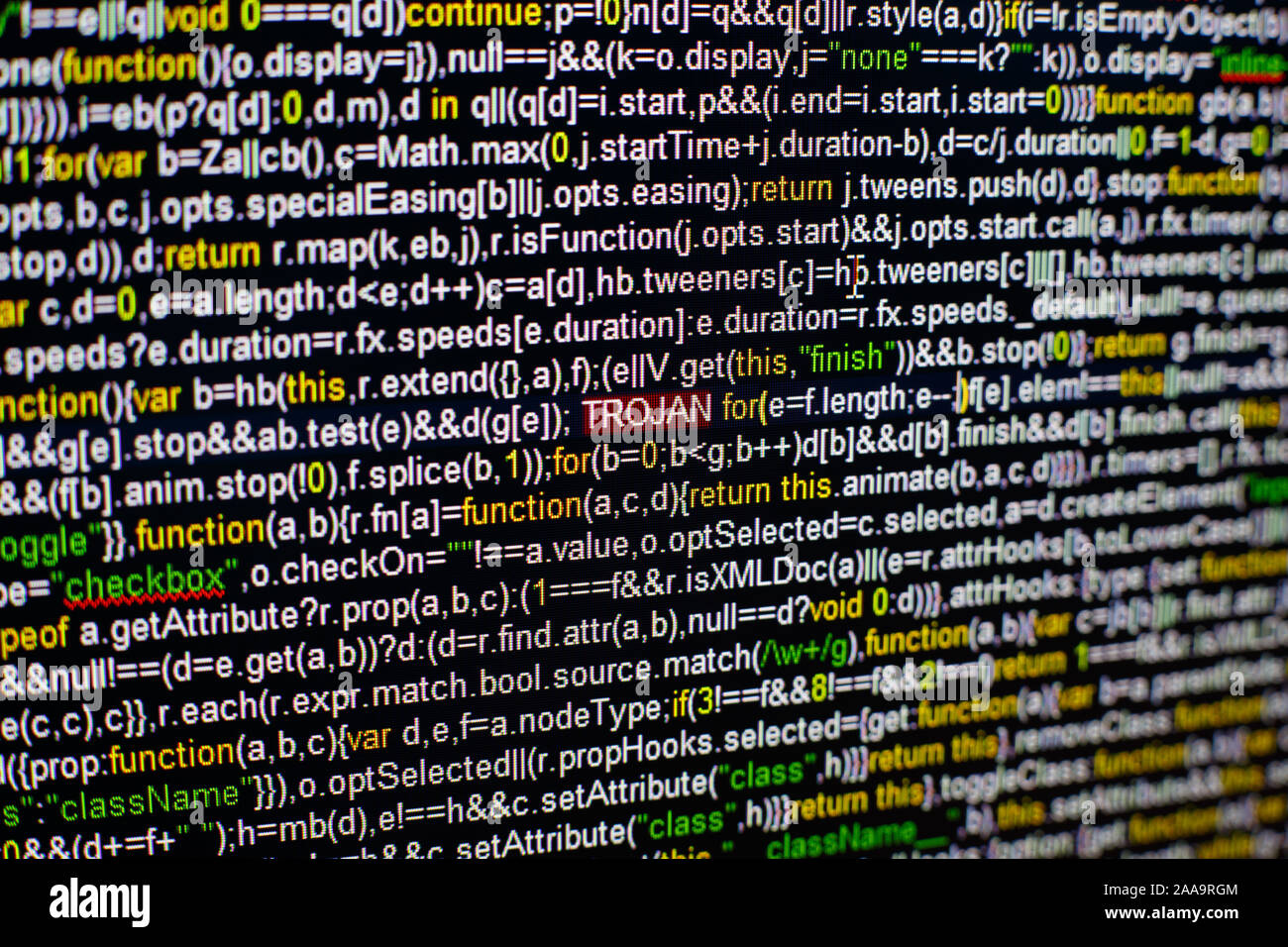 Macro photo of computer screen with program source code and highlighted ...
