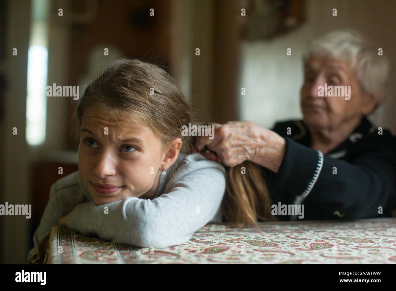 Old Granny Woman Braids A Little Girl S Granddaughter Long Hair
