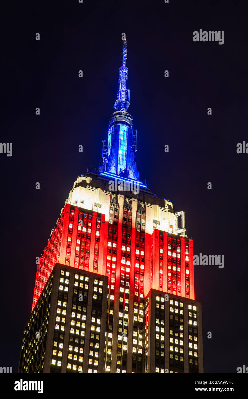 Empire State Building lit up in honor of Veterans Day with the colors of the flag of United States of America, Manhattan, New York, USA Stock Photo