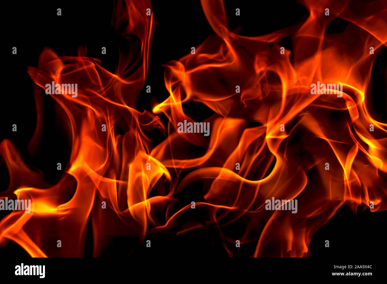 Green fire forms abstraction in black background Stock Photo - Alamy