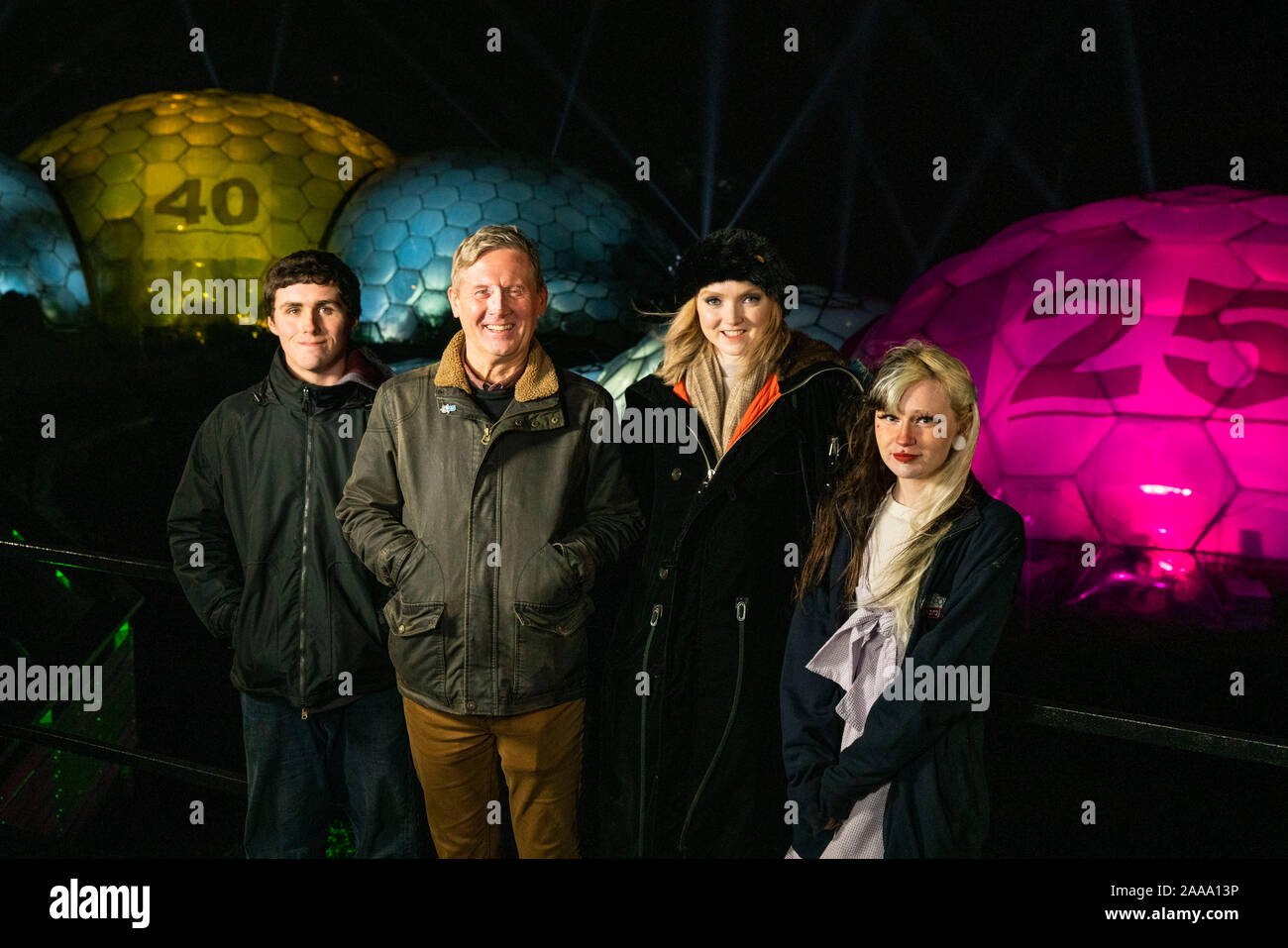 Peter Stewart, Eden Project Director of Outreach and Development, Activist and actress Lily Cole with Jordan Endean and Brogan Cawley from the Game Changer initiative look on as the biomes are turned into giant illuminated lottery balls to launch the National Lottery???s ???Thanks to You??? campaign, which celebrates 25 years of the lottery and the more than 40 billion pounds that has been raised for good causes since the first draw. Stock Photo