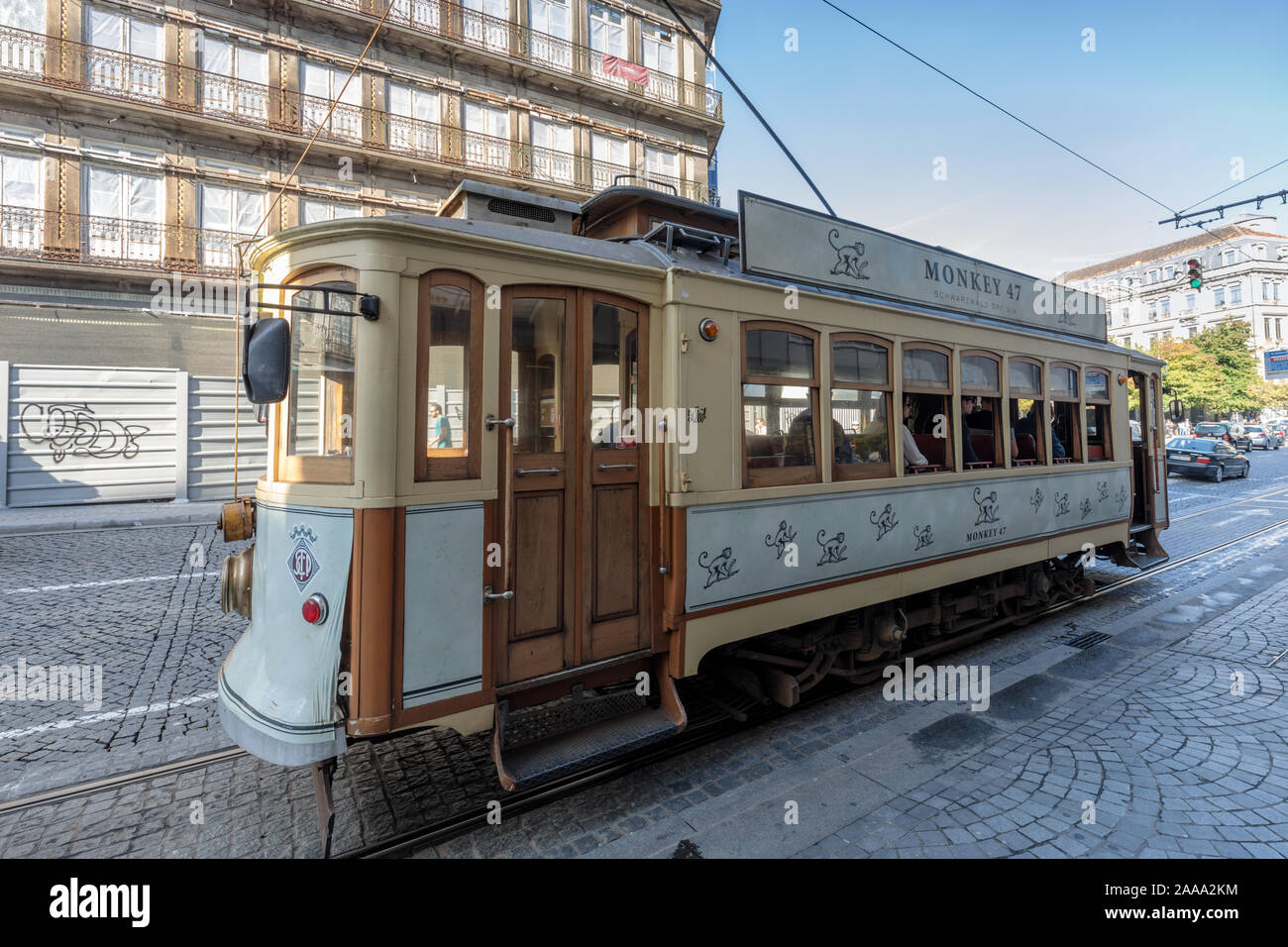 A vintage historic tram in the historical centre of Porto, Portugal Stock Photo