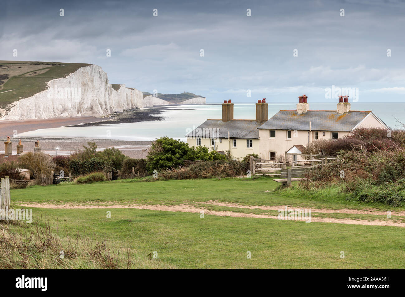 Seven Sisters chalk cliffs and Coastguard Cottages, Cuckmere Haven, Seaford Head Nature Reserve, Seaford, East Sussex, England, UK Stock Photo