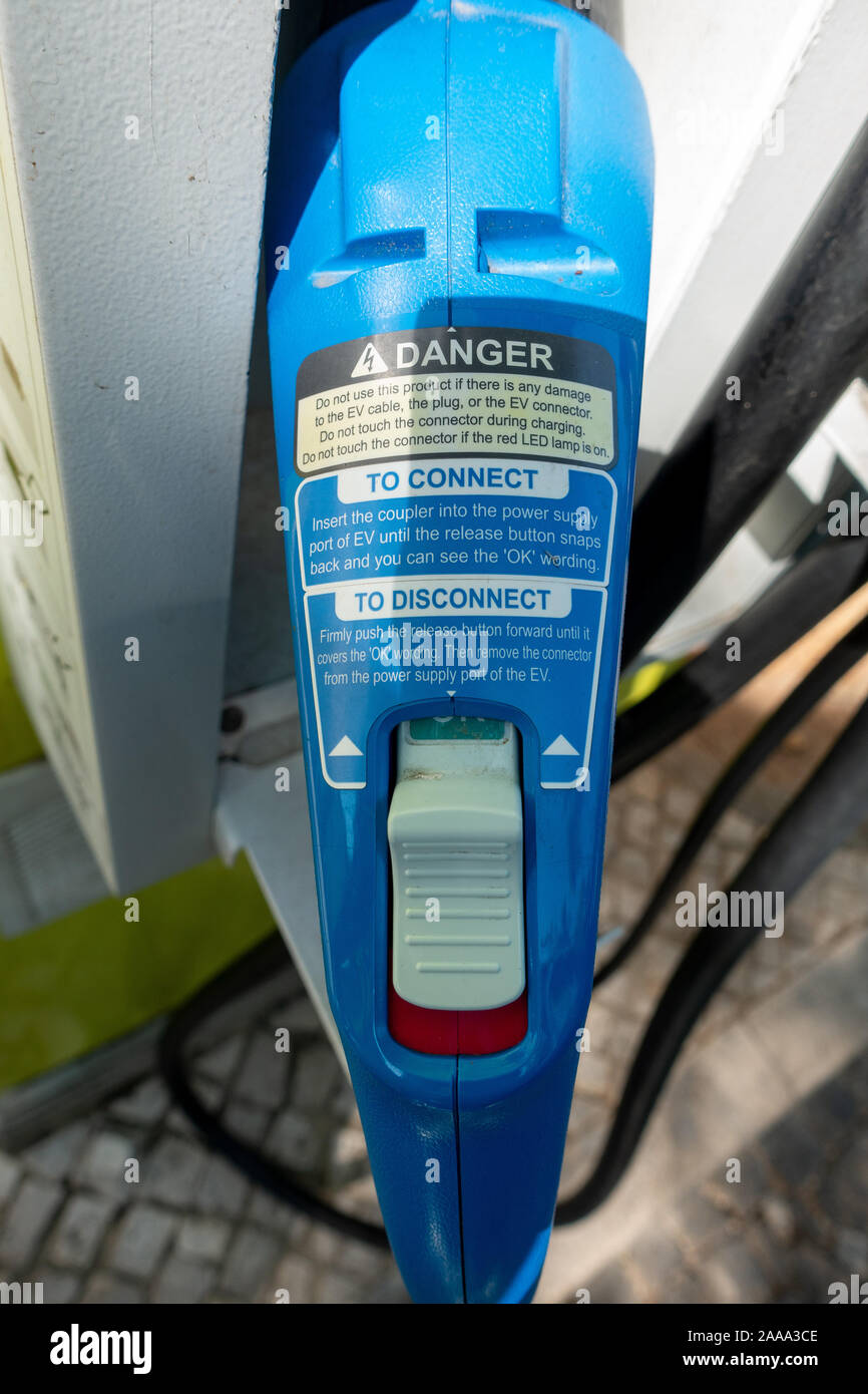 Electric Vehicle Charging Handsets Close Up Stock Photo