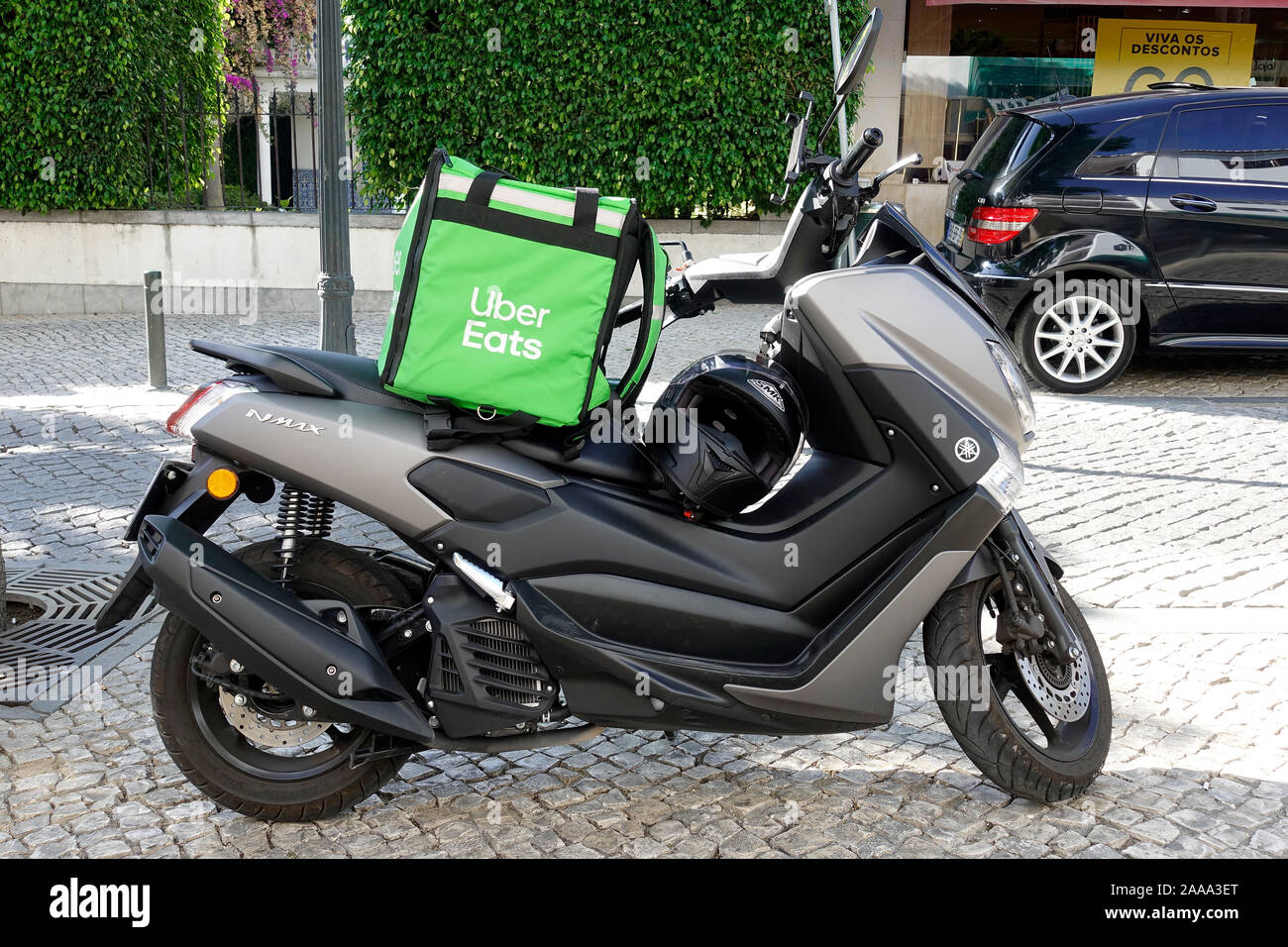Uber Eats Hot Food Home Delivery Bag Backpack On A Motorcycle In Cascais Portugal Stock Photo