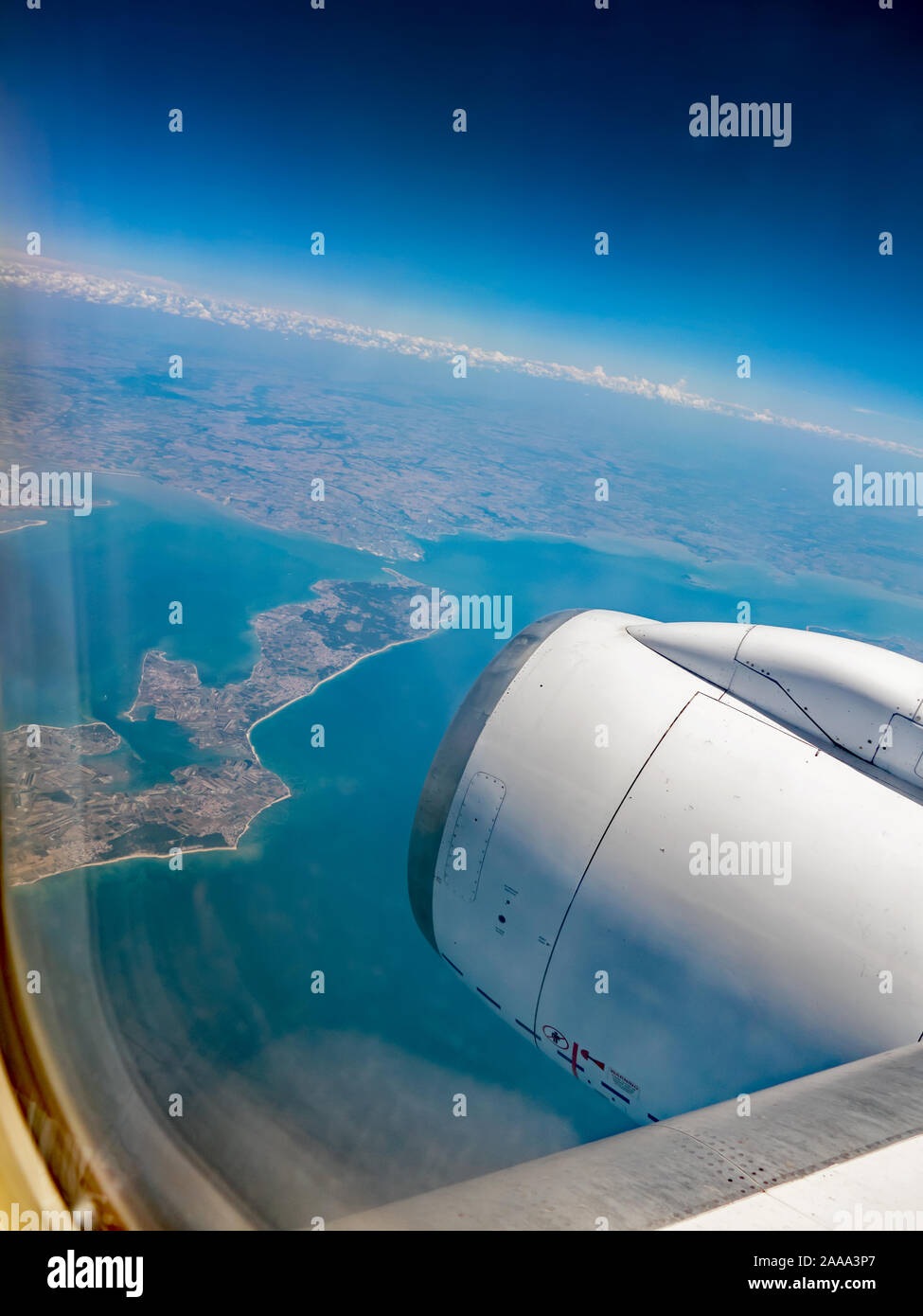 View of clouds and sky from the plane window during the flight ...