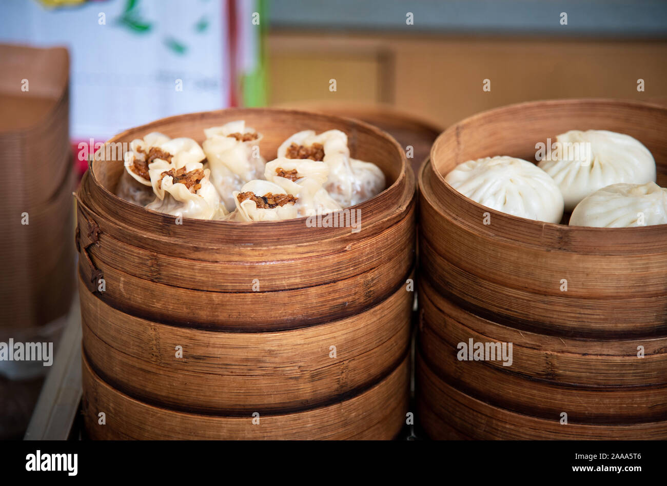 Fresh dim sum in bamboo steamer on Chinese Asian food street Stock Photo