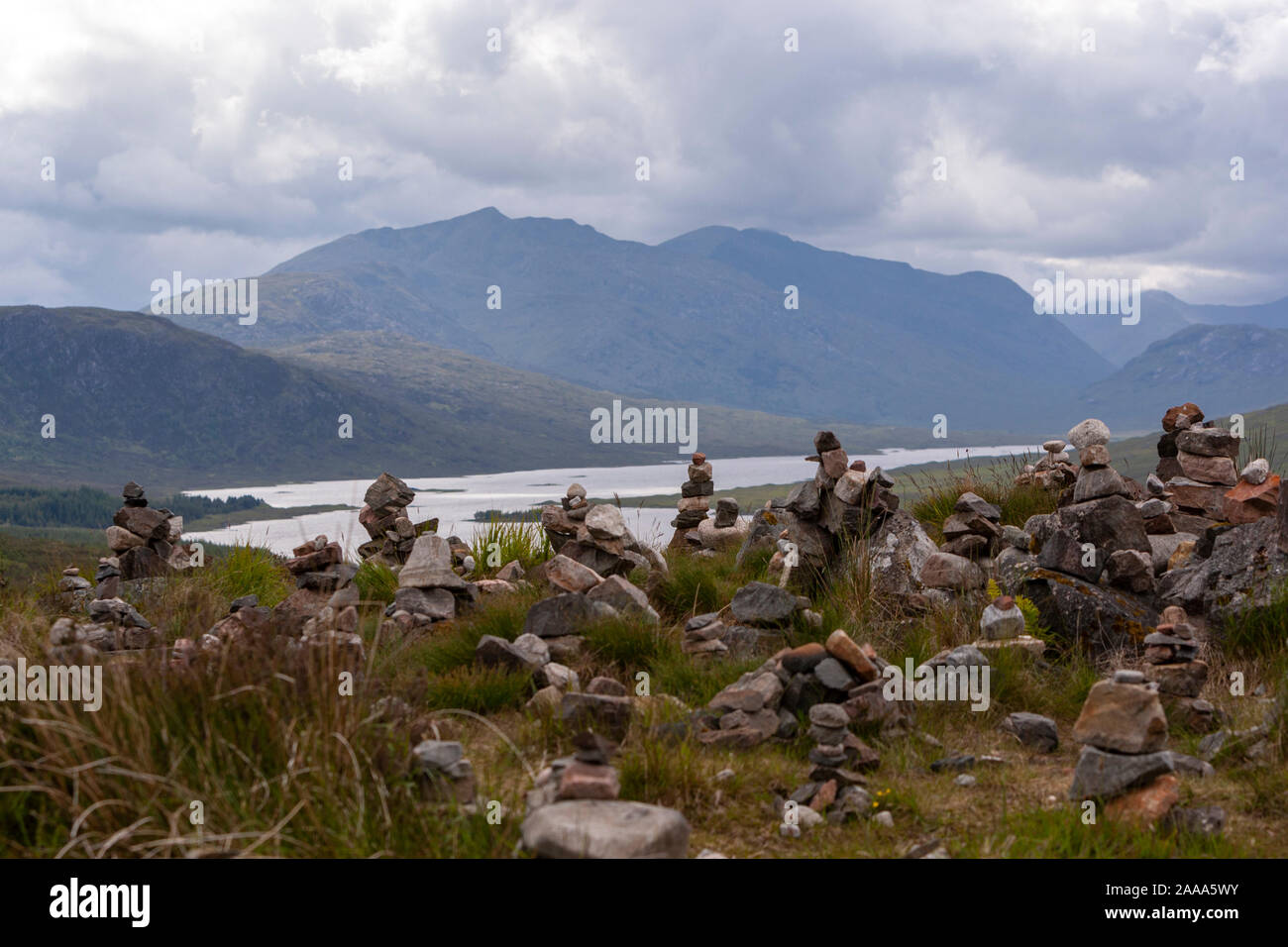 Rock balancing or stone balancing in Loch Loyne, Northwest Highlands of Scotland, UK Stock Photo