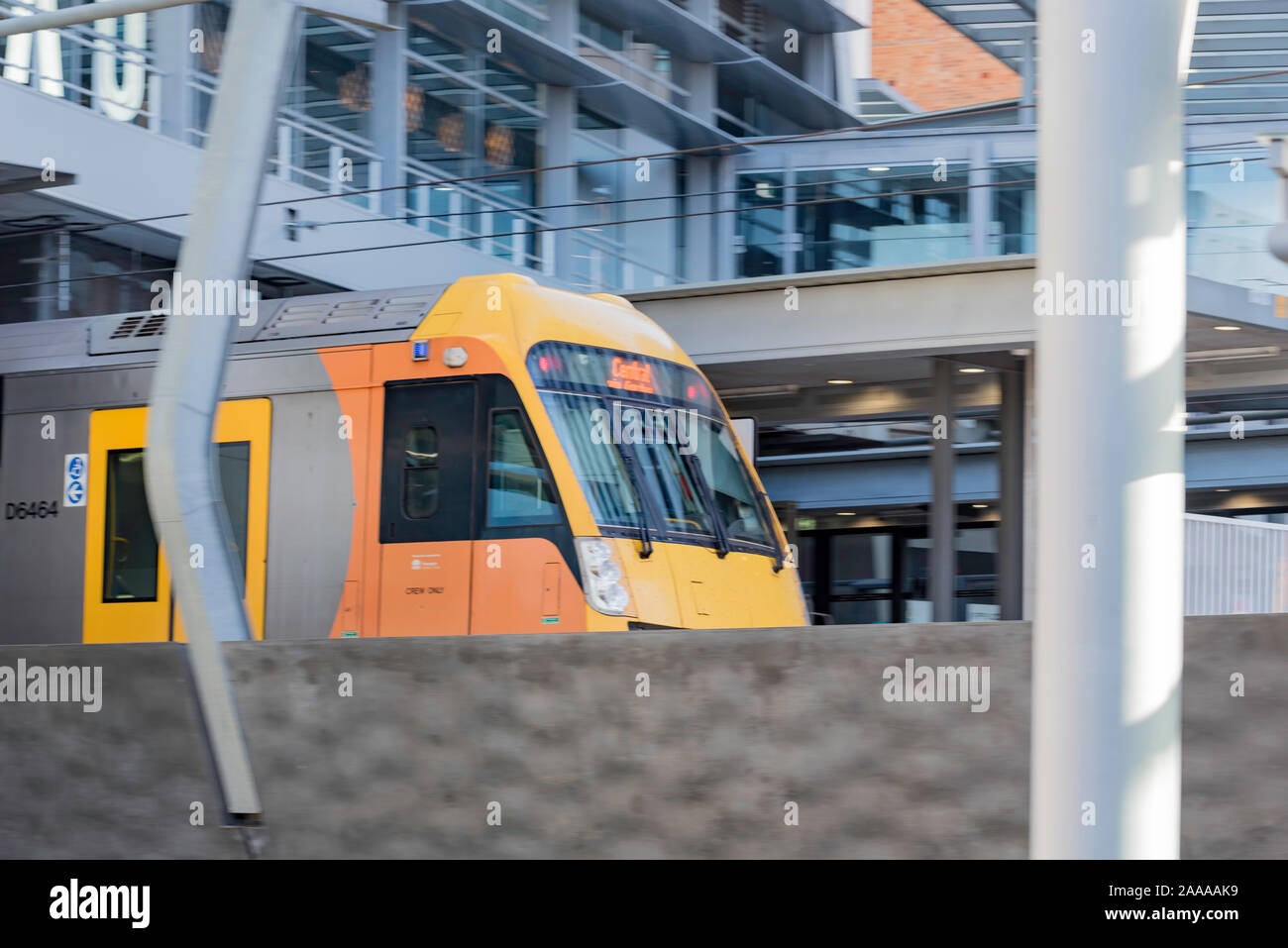 A modern double deck Waratah Series train leaves the elevated station at Chatswood in Sydney, Australia Stock Photo