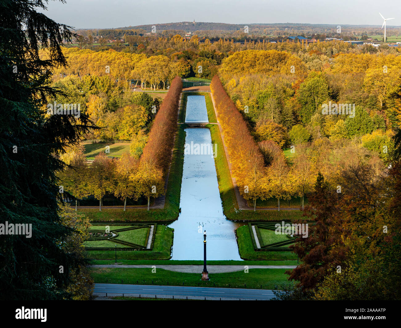 Elevated view on nice park with straight channel during colorful autumn Stock Photo