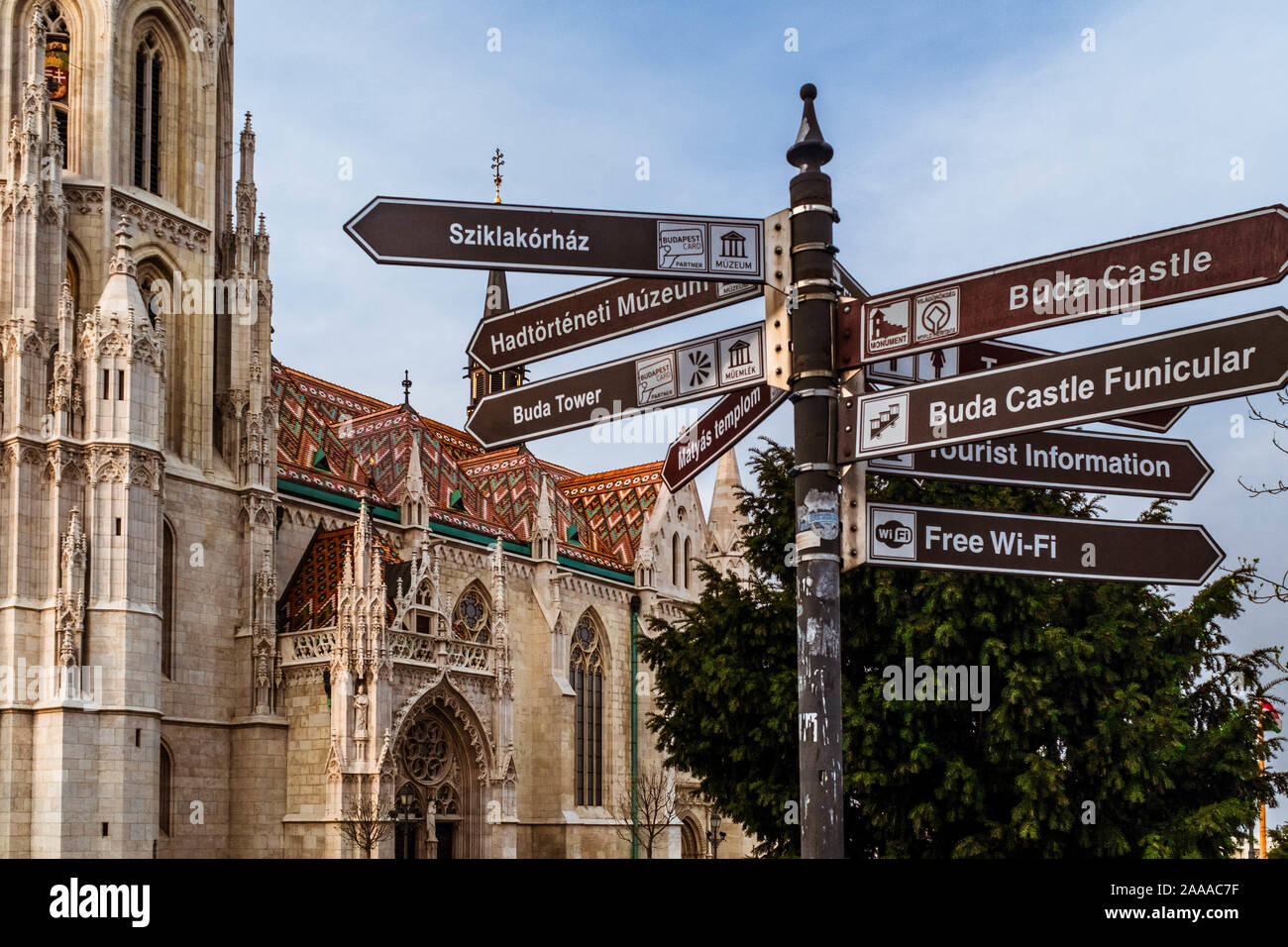 Direction signpost in front of Matthias Church. Stock Photo