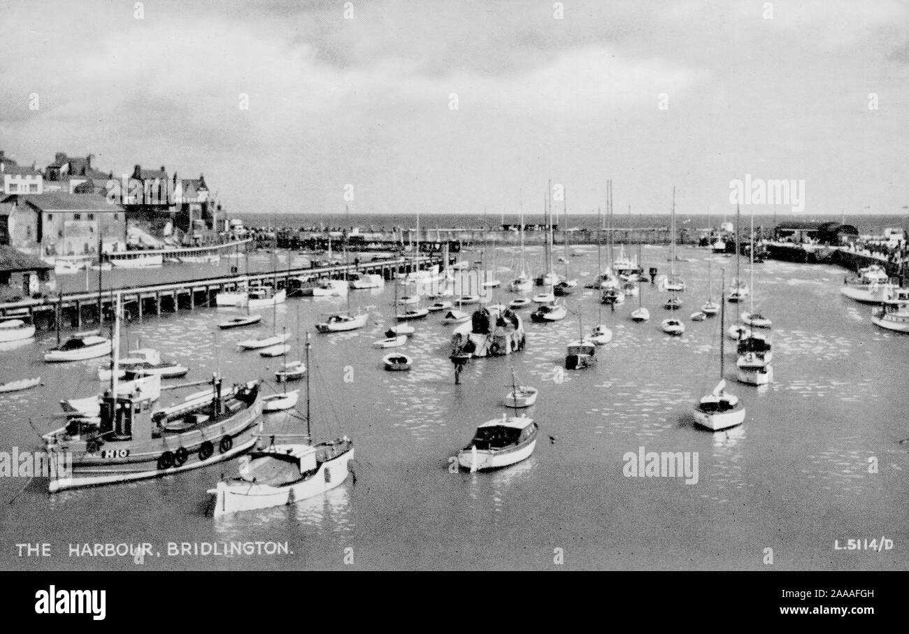 Boats in Harbour, Bridlington England, old postcard Stock Photo