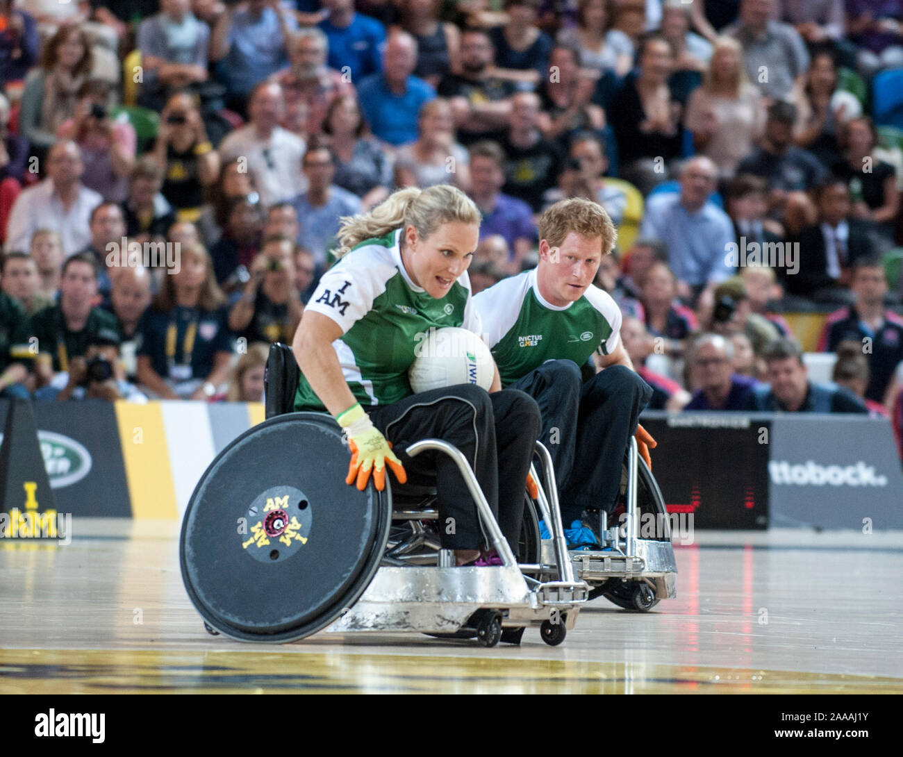 Prince Harry with Mike and Zara Tindall competing in a celebrity wheelchair rugby game at the
