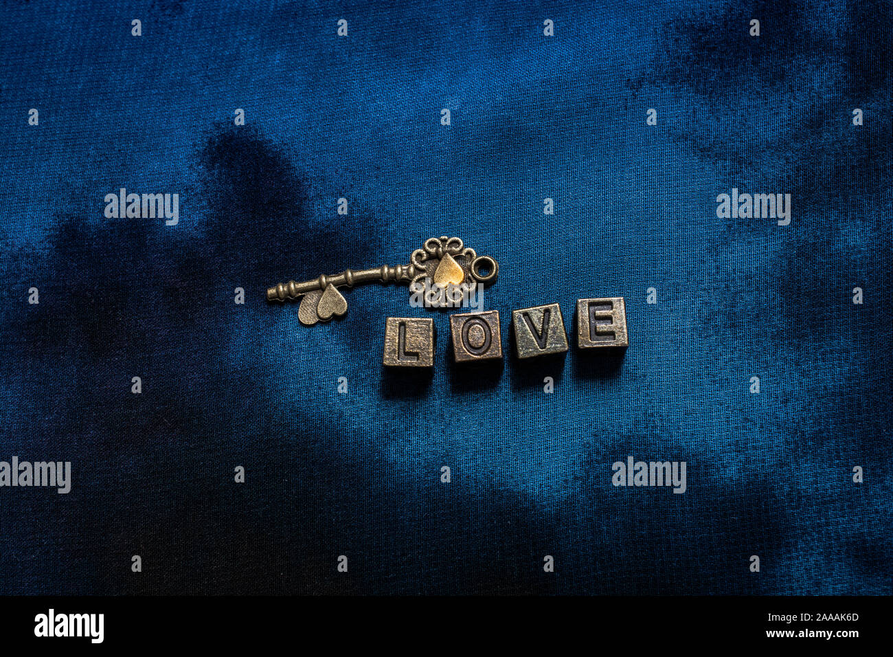 Ornamental keys around the Love wording with retro metal letters Stock Photo