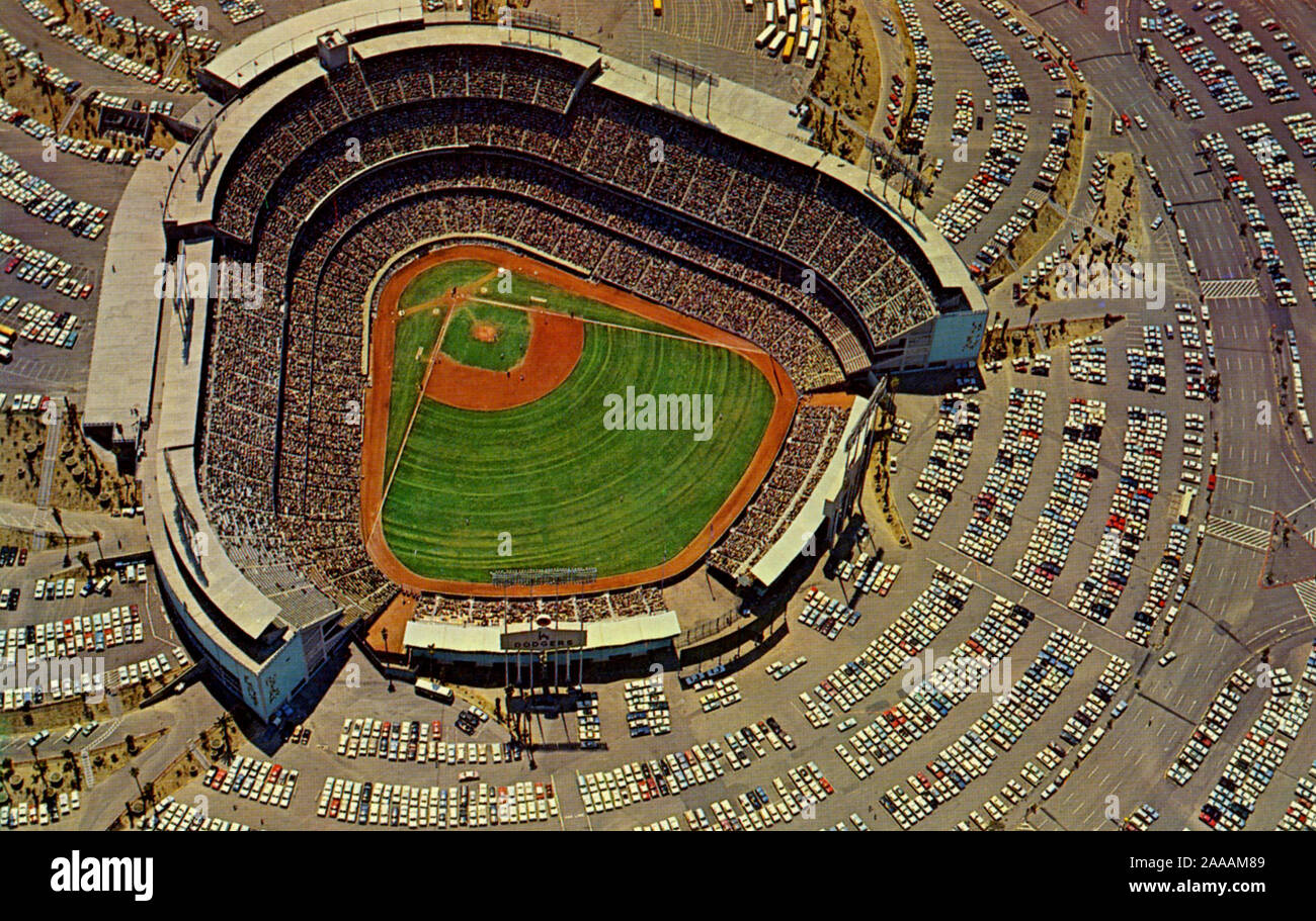 Aerial view of Dodger Stadium in 1960's era postcard. Dodger Stadium opened in 1962 for the Los Angeles Dodgers Major League Baseball season. The Dodgers had relocated to L.A. from Brooklyn in 1958 and played their first few seasons at the Memorial Coliseum before construction was complete. Stock Photo