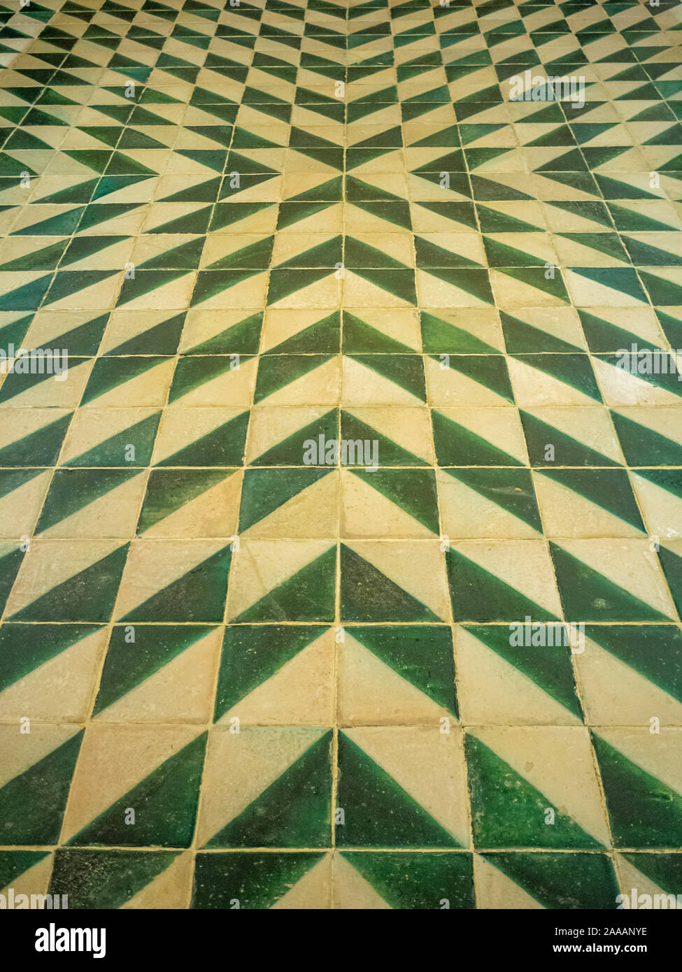 Optical effect in green and white floor tiles Stock Photo