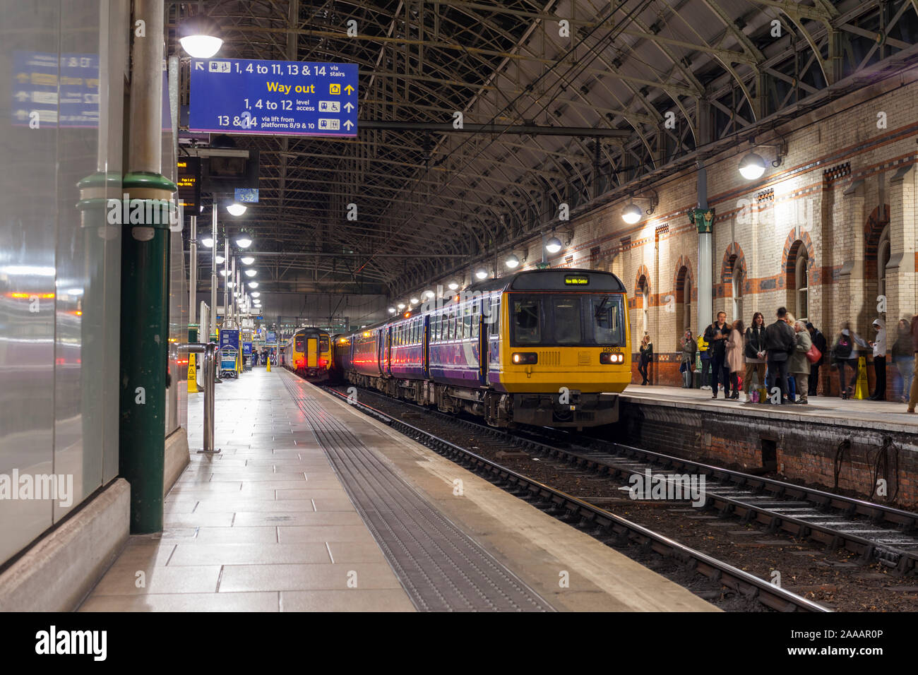Arriva Northern rail class 142 pacer train at Manchester Piccadilly with a class 156 sprinter to the left. Stock Photo