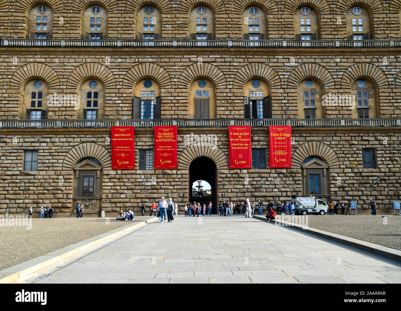 Façade of Palazzo Pitti, a famous museum complex in the historic centre of Florence, Unesco World Heritage Site, with tourists, Tuscany, Italy Stock Photo