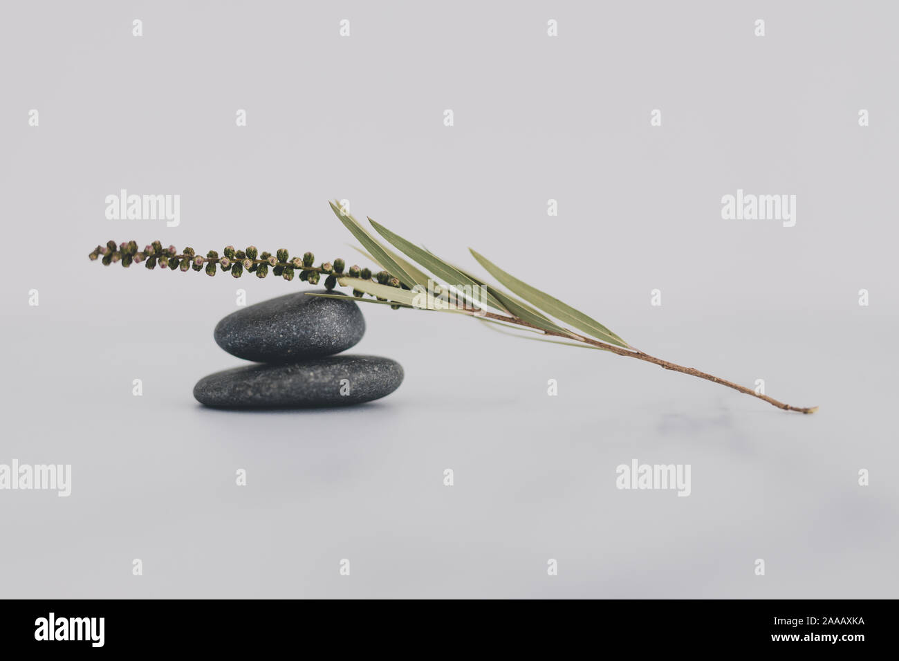minimalist calming visuals conceptual still-life, stacked pebbles with