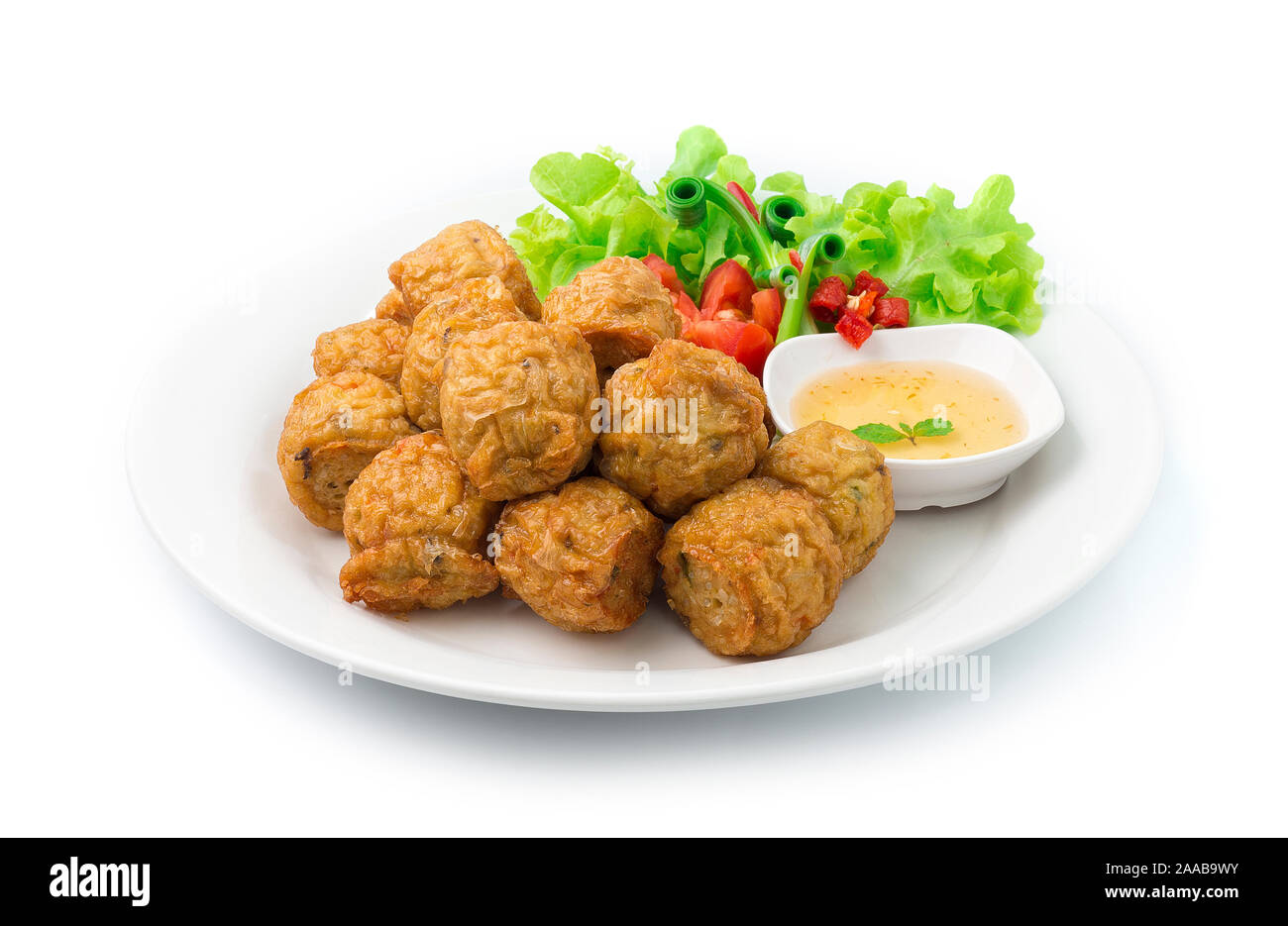 Chicken Rolls deep fried mixed ingredient Asian Food dish Thai style served plum sweet chili sauce decorate carved vegetables and chili carved side vi Stock Photo