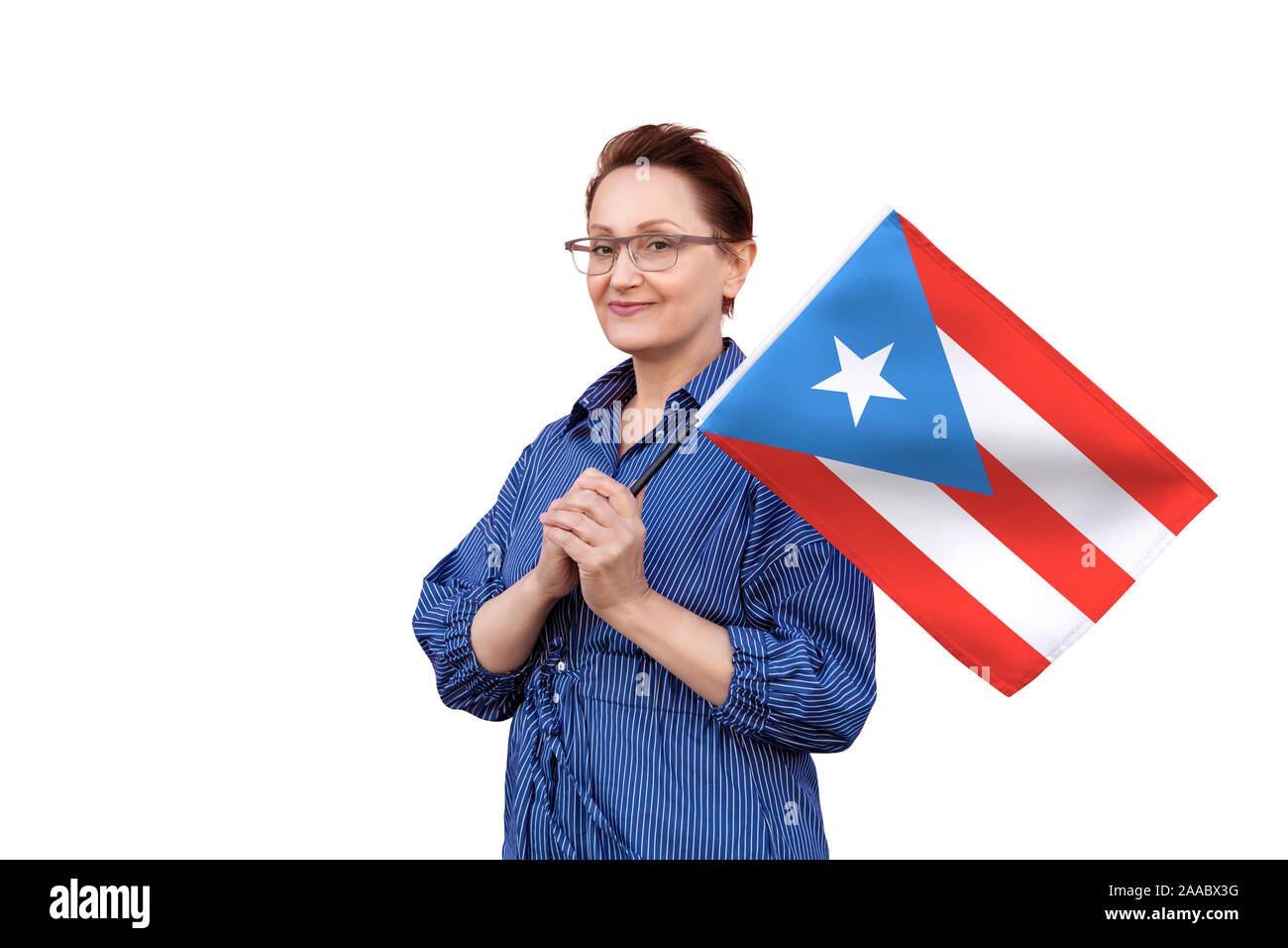 Puerto Rico flag. Woman holding Puerto Rican flag. Nice portrait of middle aged lady 40 50 years old holding a large flag isolated on white background Stock Photo