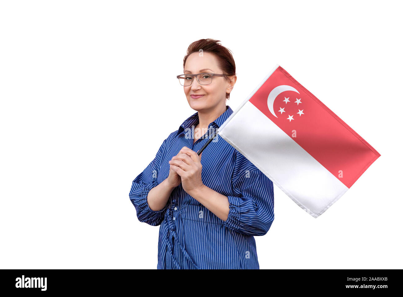 Singapore flag. Woman holding flag. Nice portrait of middle aged lady