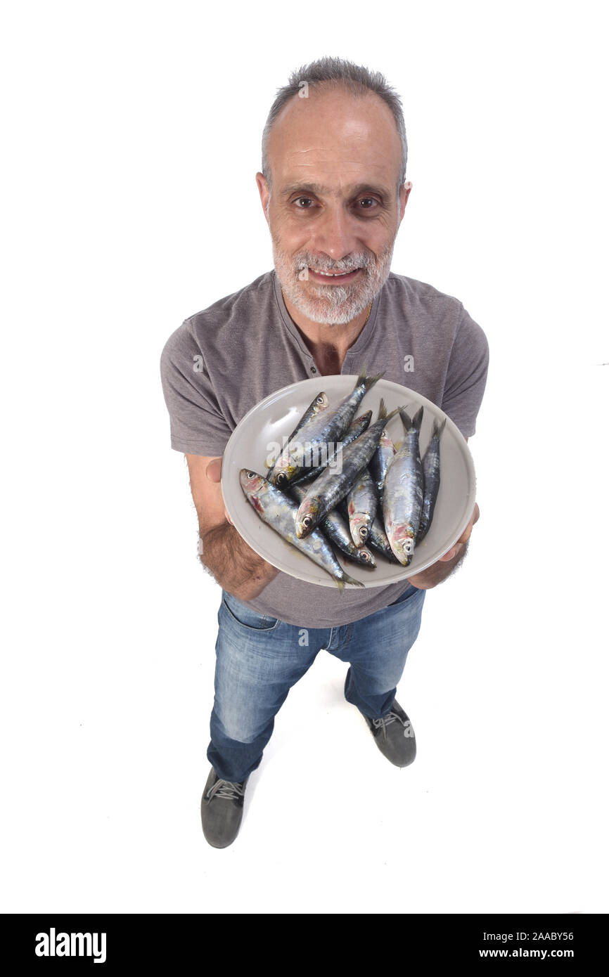 man with sardine on white background Stock Photo Alamy