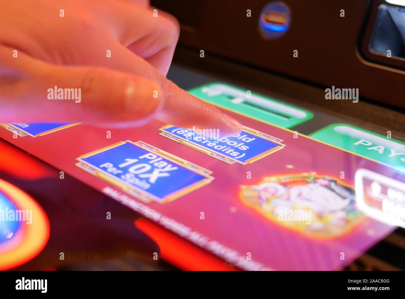 Coquitlam, BC, Canada - May 31, 2019 : Motion of people playing slot machine inside Casino Stock Photo