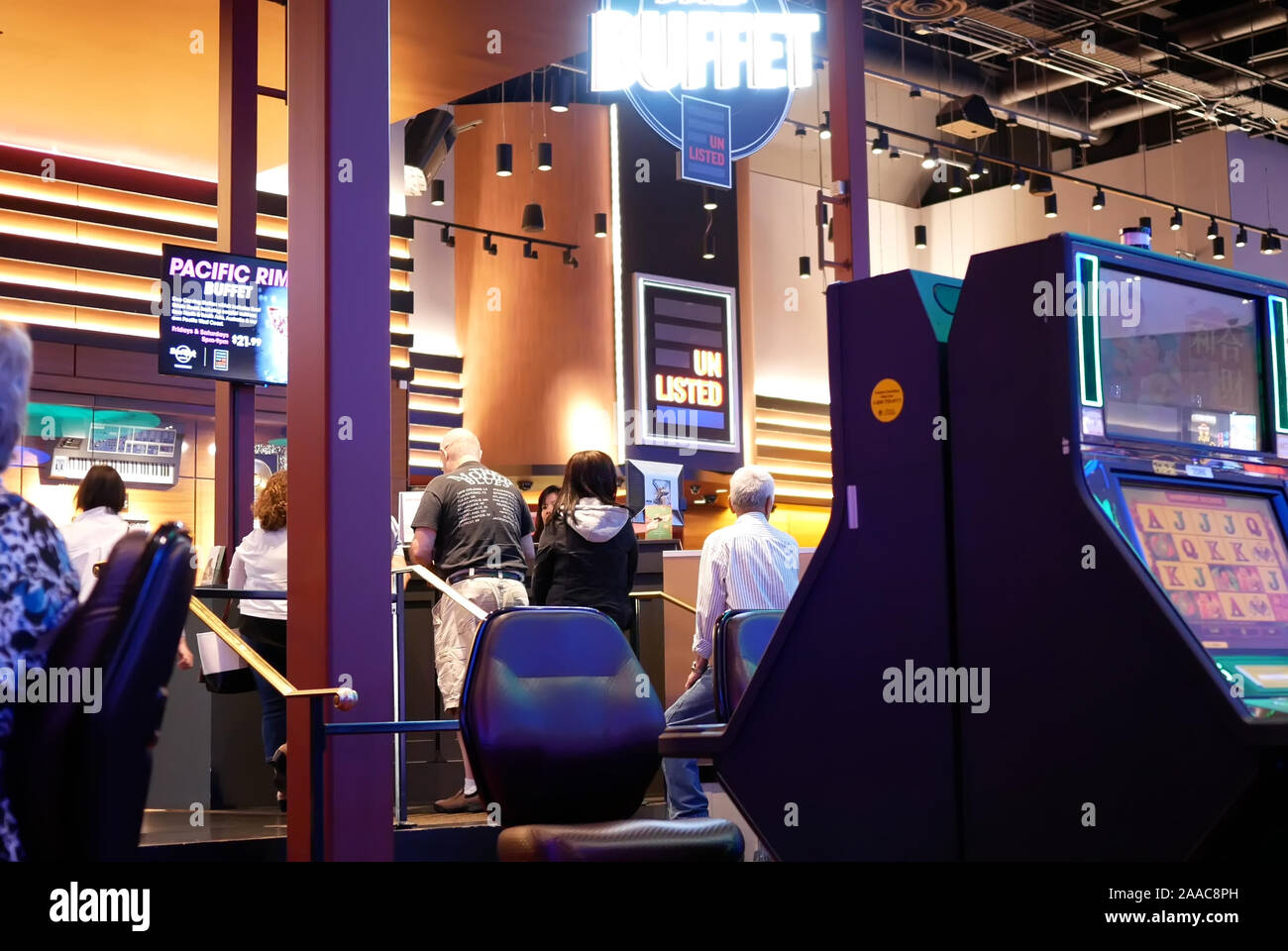 Coquitlam, BC, Canada - May 31, 2019 : Motion of people line up for entering buffet inside Casino Stock Photo