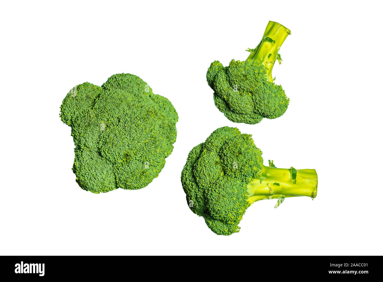 Three broccoli on a white background. Healthy vegetables. Products for vegetarian. Green vegetables. Stock Photo