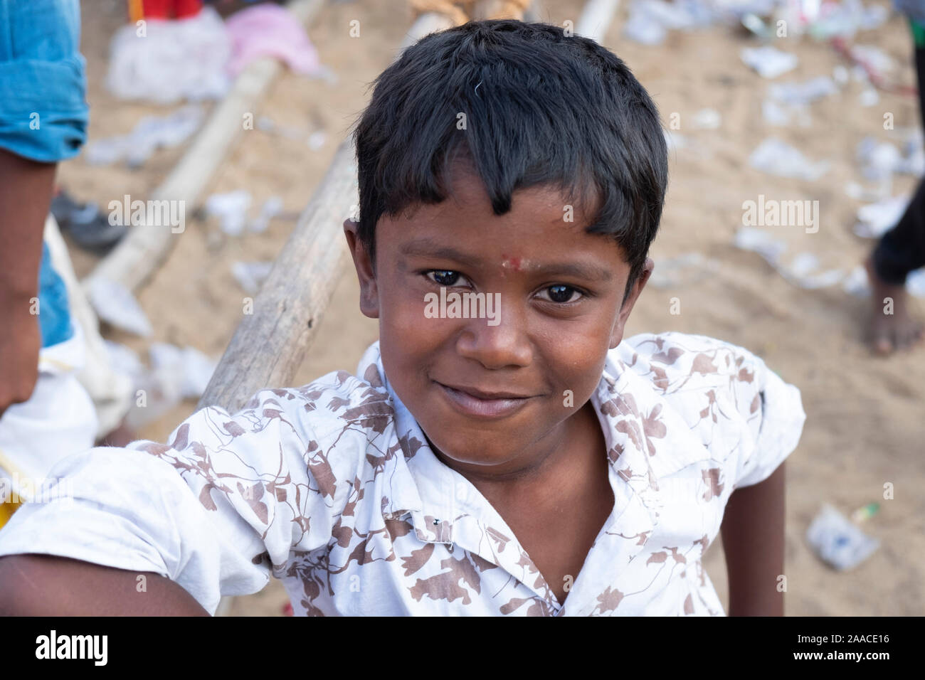 Portrait of a young boy looking at camera in Tiruchirappalli,Tamil Nadu, India Stock Photo