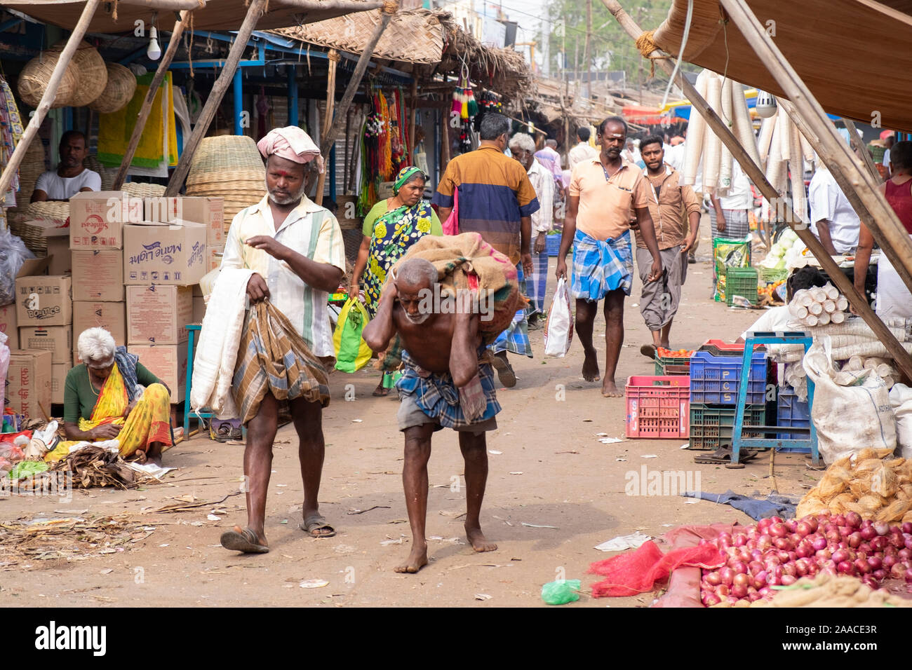 Indian man carrying sack hi-res stock photography and images - Alamy