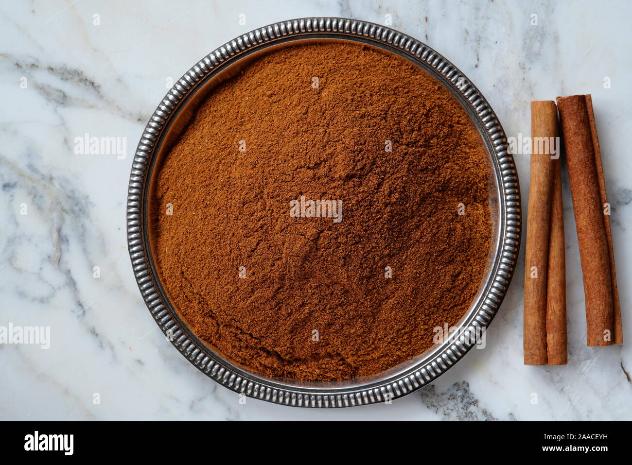 Cinnamon sticks and cinnamon powder, India, Asia Stock Photo Alamy