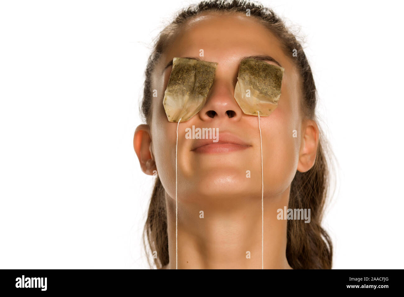 Woman Tea Bag Eyes High Resolution Stock Photography and Images Alamy