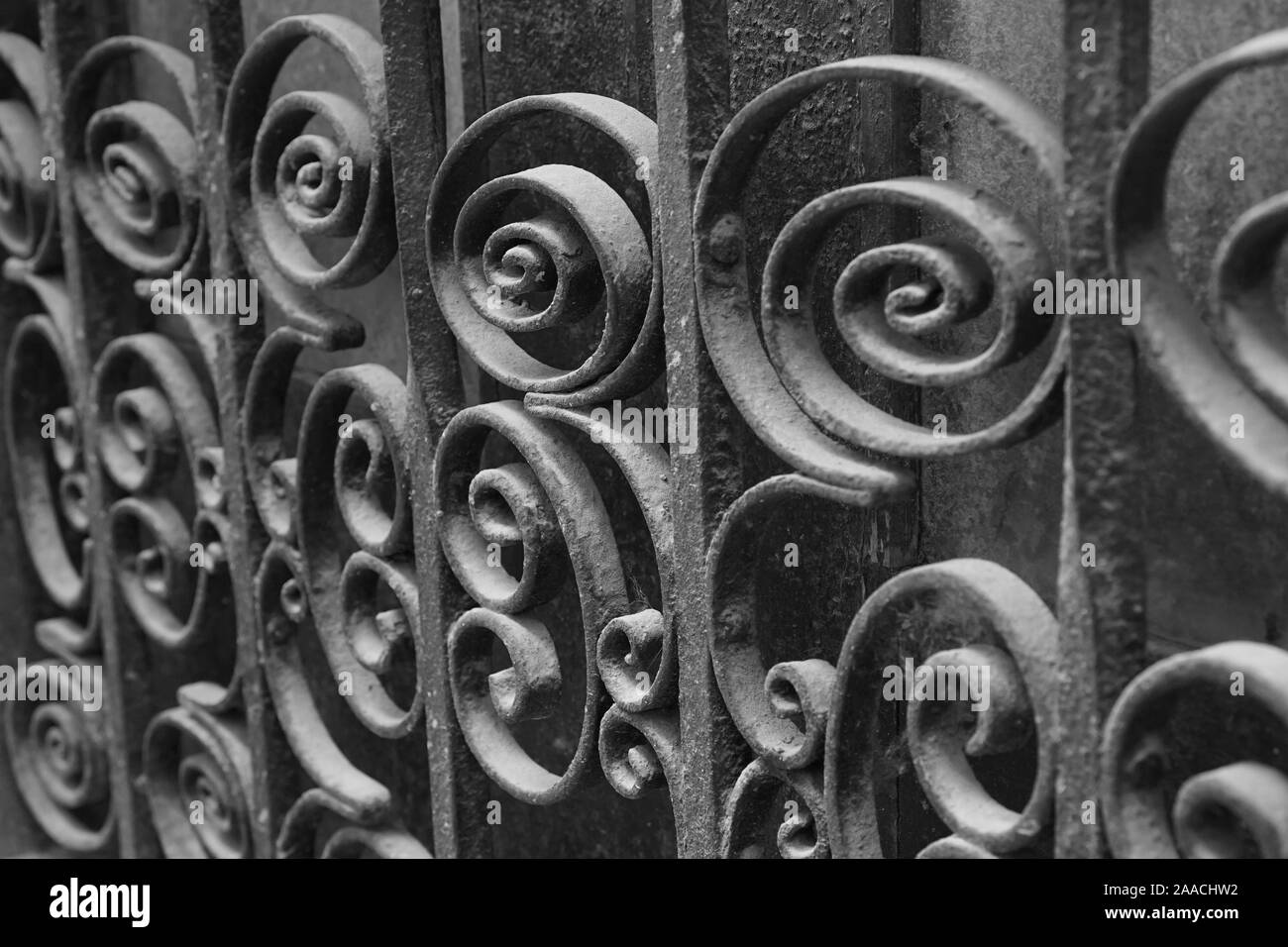 Spiral pattern on a decorative metal gate Stock Photo
