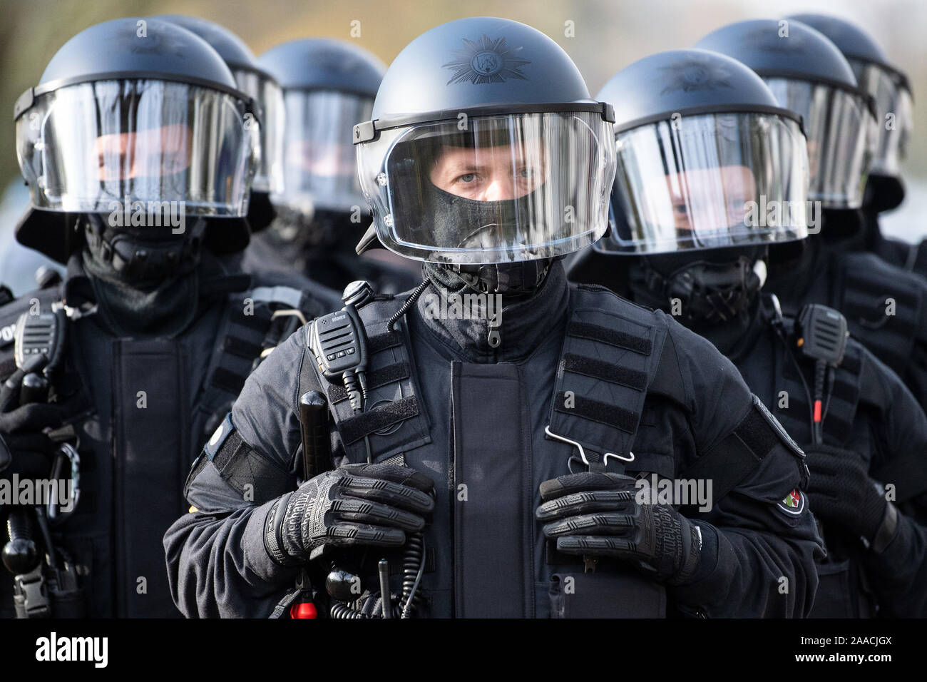 Leverkusen, Germany. 21st Nov, 2019. Police officers with helmets and protective equipment practice against football fans. Again and again police officers have to do with aggressive football fans, at Bundesliga matches there are often hundreds of people on the spot. The emergency forces in Leverkusen have rehearsed what to pay particular attention to during such missions. Credit: Federico Gambarini/dpa/Alamy Live News Stock Photo