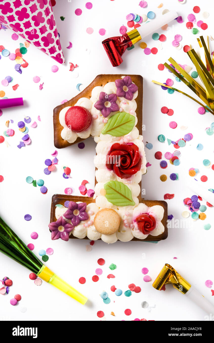 Number One Cake Decorated With Flowers Macarons And Confetti