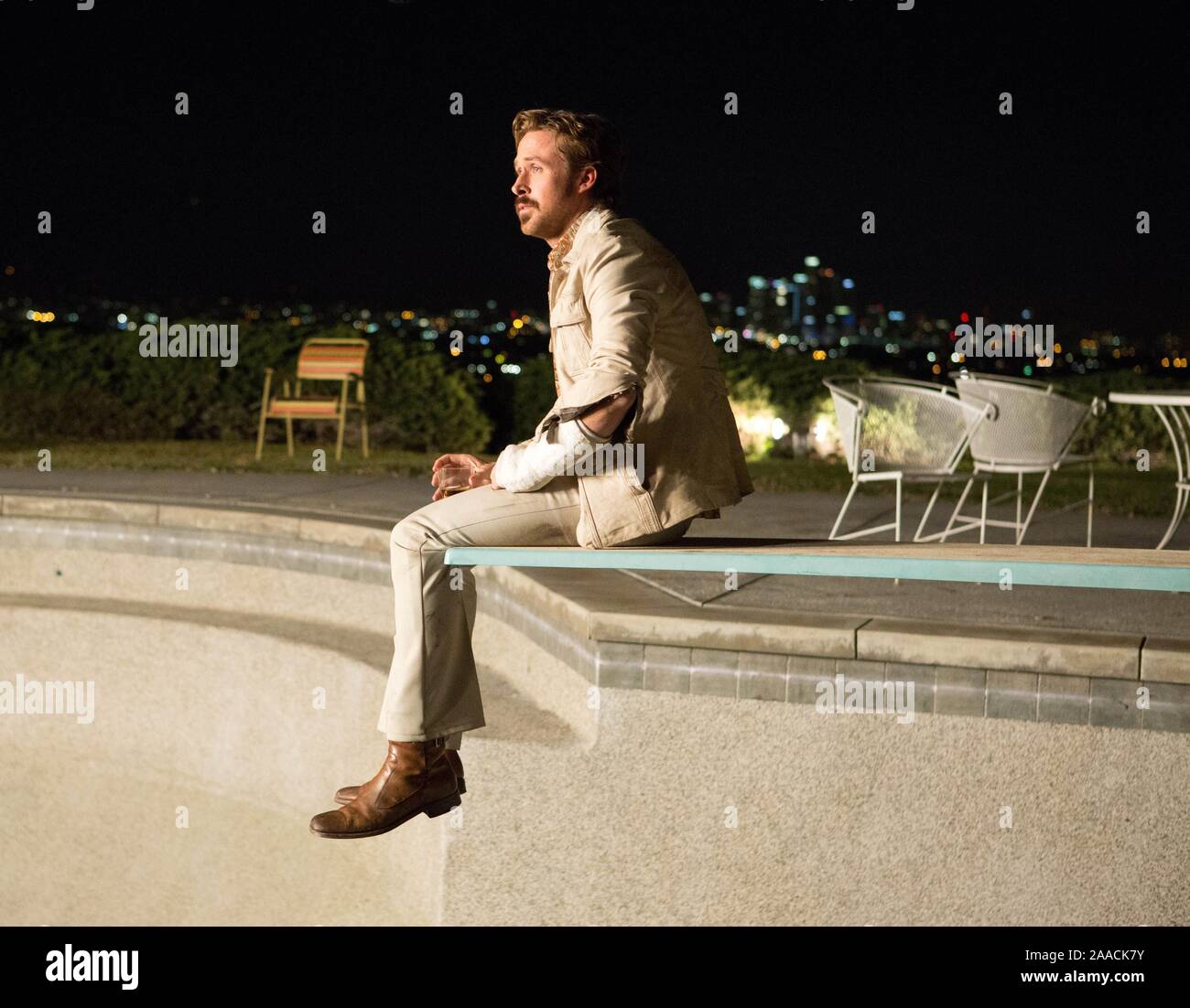 RYAN GOSLING in THE NICE GUYS (2016), directed by SHANE BLACK. Credit ...