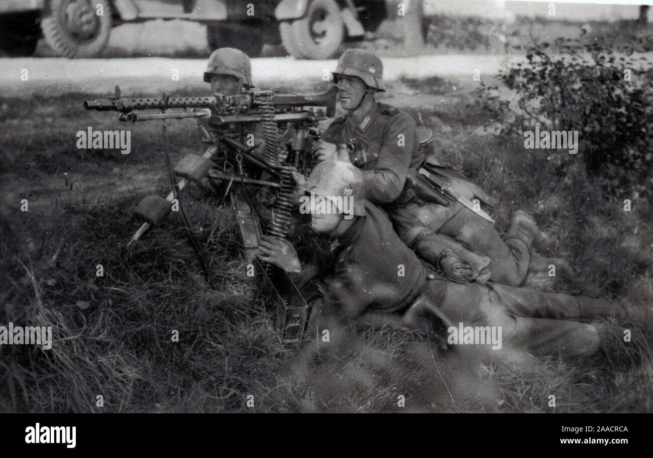 German Soldiers with an MG34 on a Heavy Mount during the Invasion of France 1940 . World War Two B/W Photo of German Origin Stock Photo