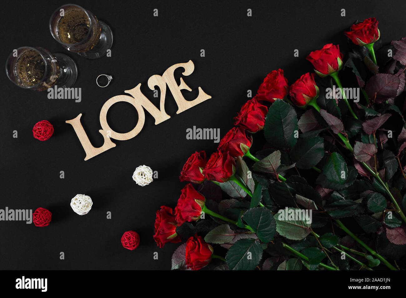 Two champagne glasses red roses hi-res stock photography and images - Alamy