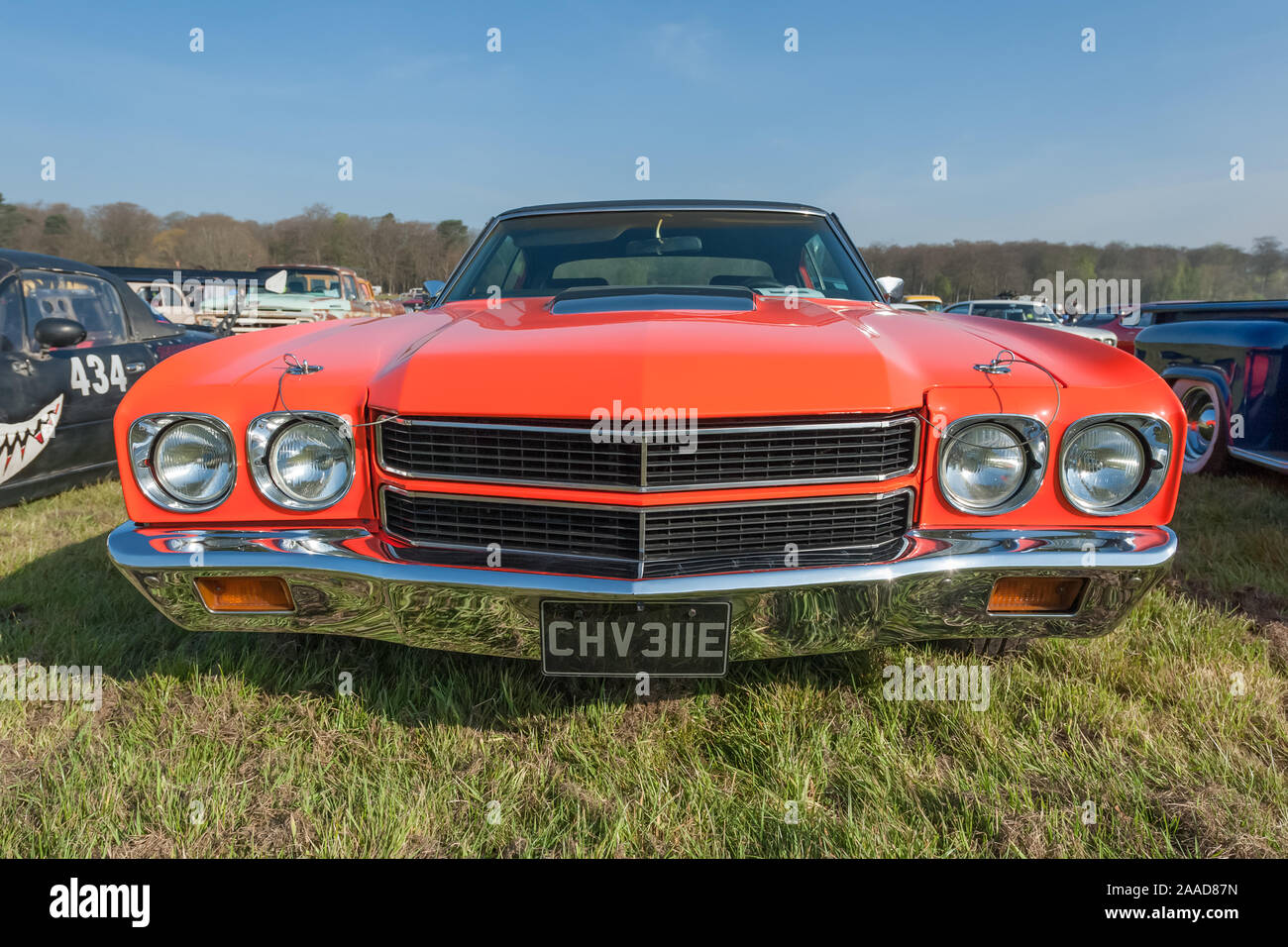 Vintage American Chevrolet with unique registration at a meeting of